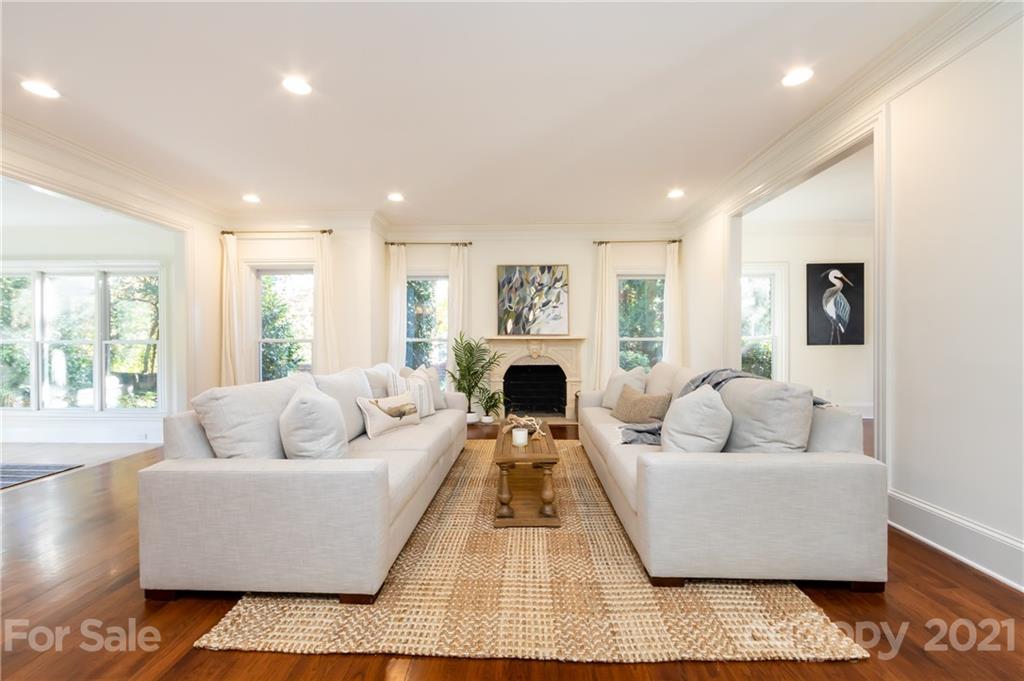 4407 Oglukian Road Charlotte, NC 28226 - Photo 22 of 48 a living room with furniture and a fireplace