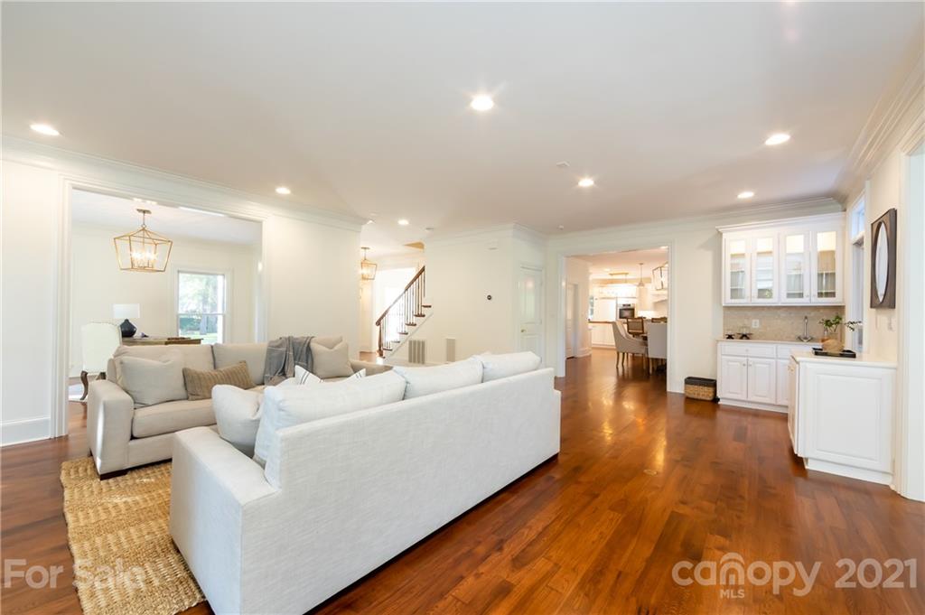 4407 Oglukian Road Charlotte, NC 28226 - Photo 23 of 48 a living room with furniture and a wooden floor