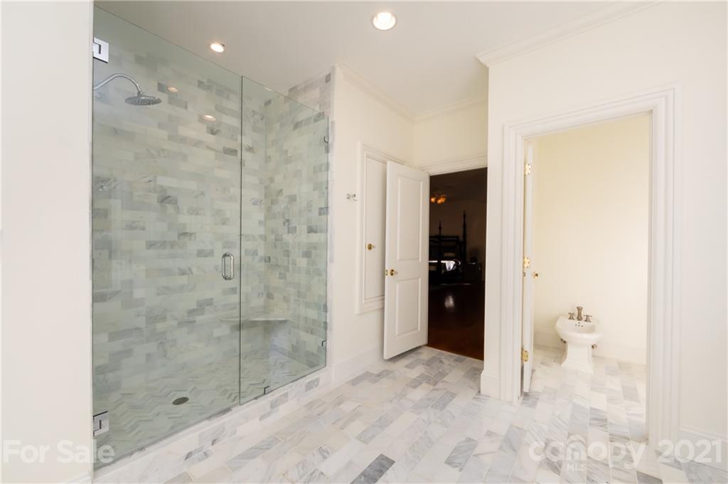 4407 Oglukian Road Charlotte, NC 28226 - Photo 35 of 48 a bathroom with a shower and a toilet