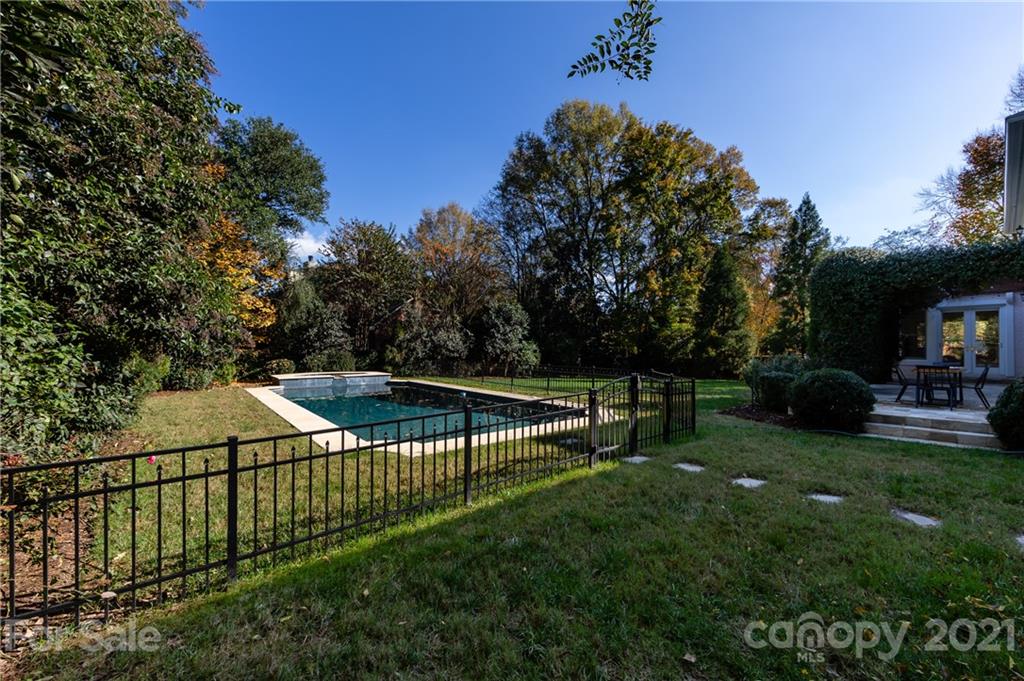 4407 Oglukian Road Charlotte, NC 28226 - Photo 37 of 48 a view of a house with backyard and sitting area