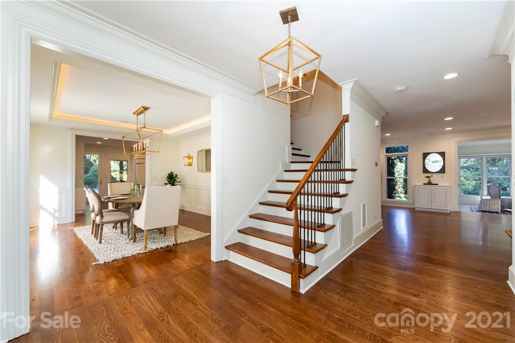 4407 Oglukian Road Charlotte, NC 28226 - Photo 5 of 48 a view of entryway and hall with wooden floor