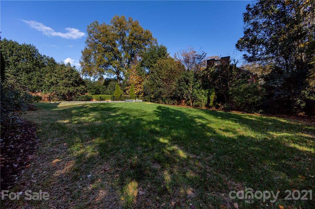 4407 Oglukian Road Charlotte, NC 28226 - Photo 41 of 48 a view of a field with an trees