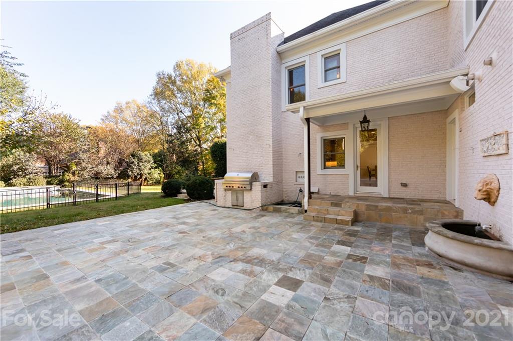4407 Oglukian Road Charlotte, NC 28226 - Photo 48 of 48 a view of a house with backyard and trees
