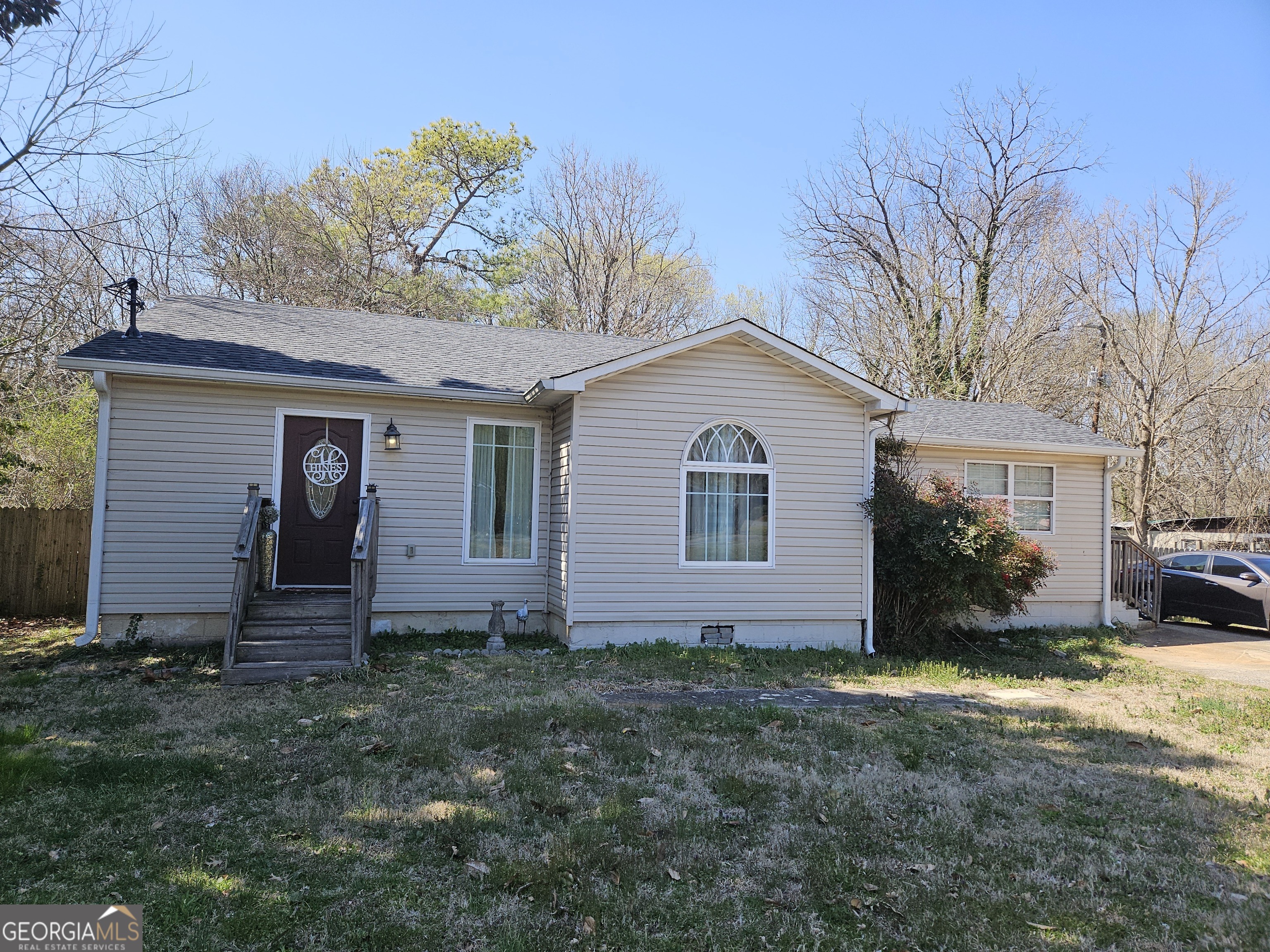 2416 Maple Road Southeast Rome, GA 30161 - Photo 1 of 1 a front view of house with a garden