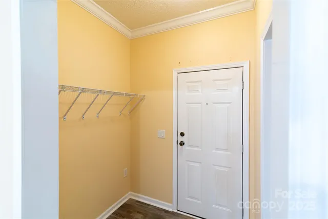 a bathroom with a shower and a door