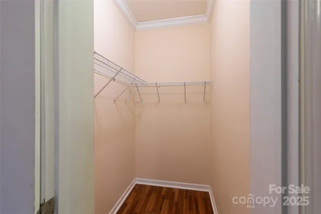 a view of small space with empty racks on the wall