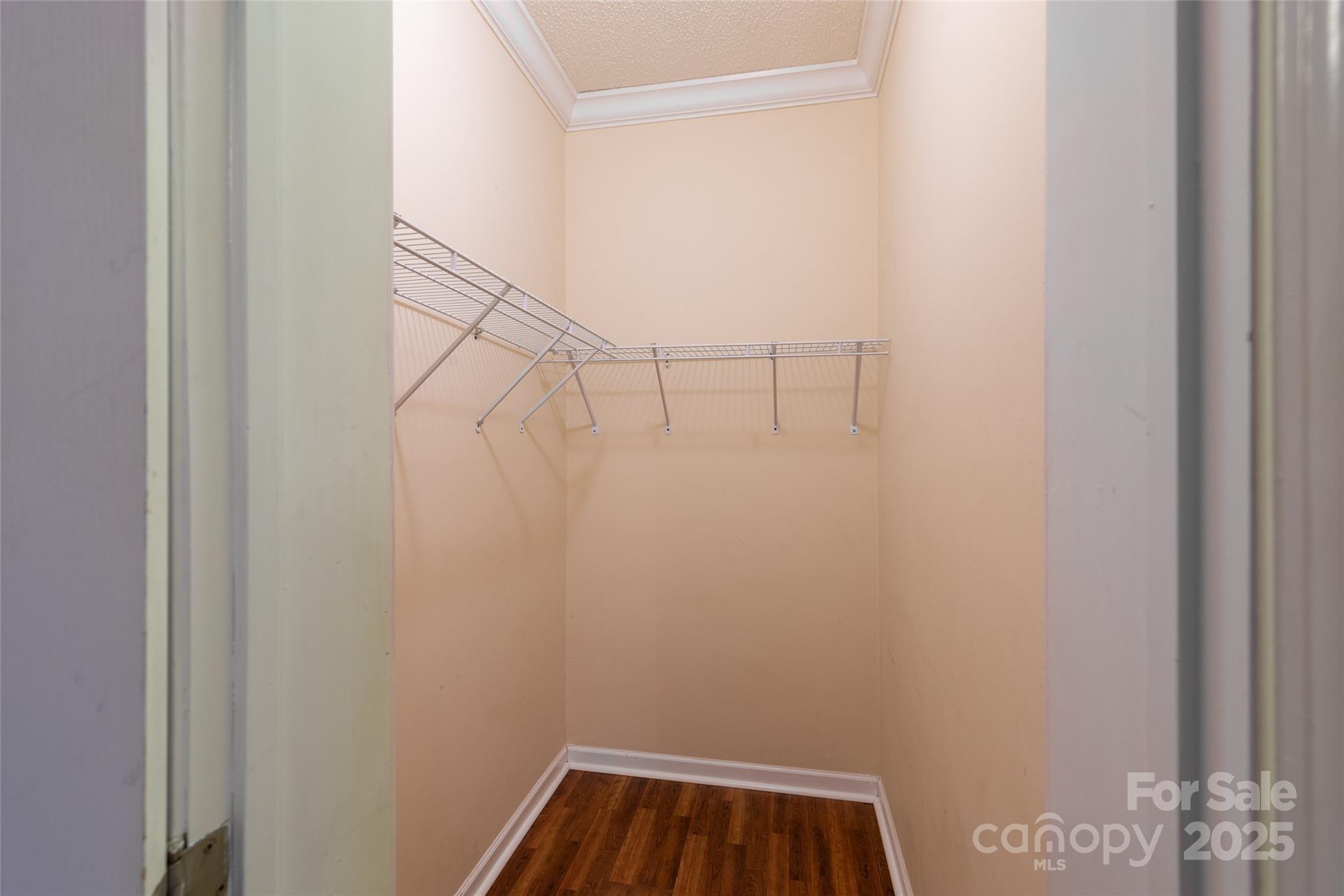 407 Monteith Gap Road Cullowhee, NC 28723 - Photo 21 of 23 a view of small space with empty racks on the wall