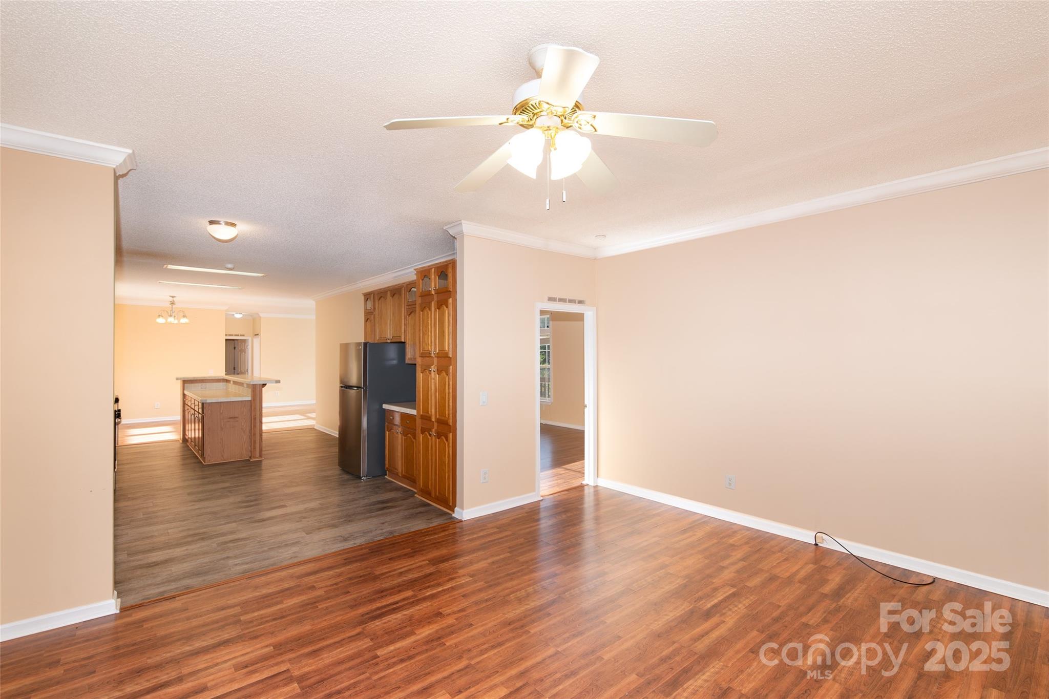 407 Monteith Gap Road Cullowhee, NC 28723 - Photo 10 of 23 a view of kitchen with furniture and wooden floor