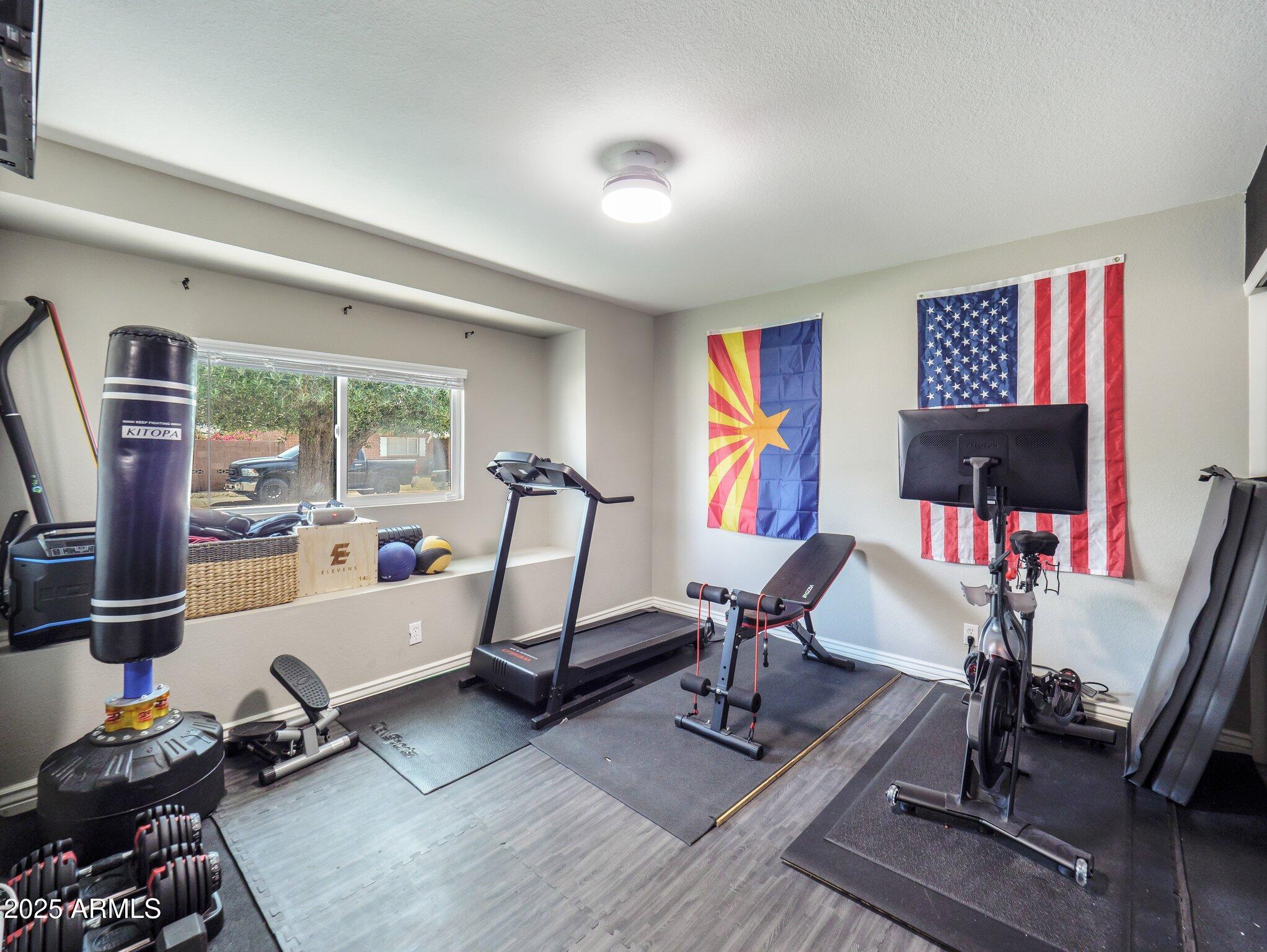 8728 East Monte Vista Road Scottsdale, AZ 85257 - Photo 18 of 28 a view of a room with gym equipment