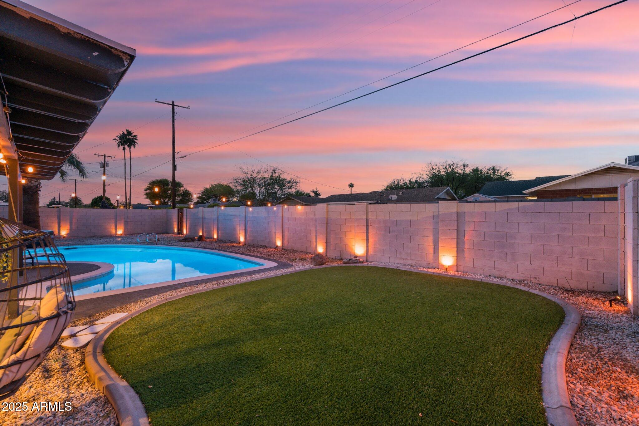 8728 East Monte Vista Road Scottsdale, AZ 85257 - Photo 22 of 28 a view of a backyard with sitting area