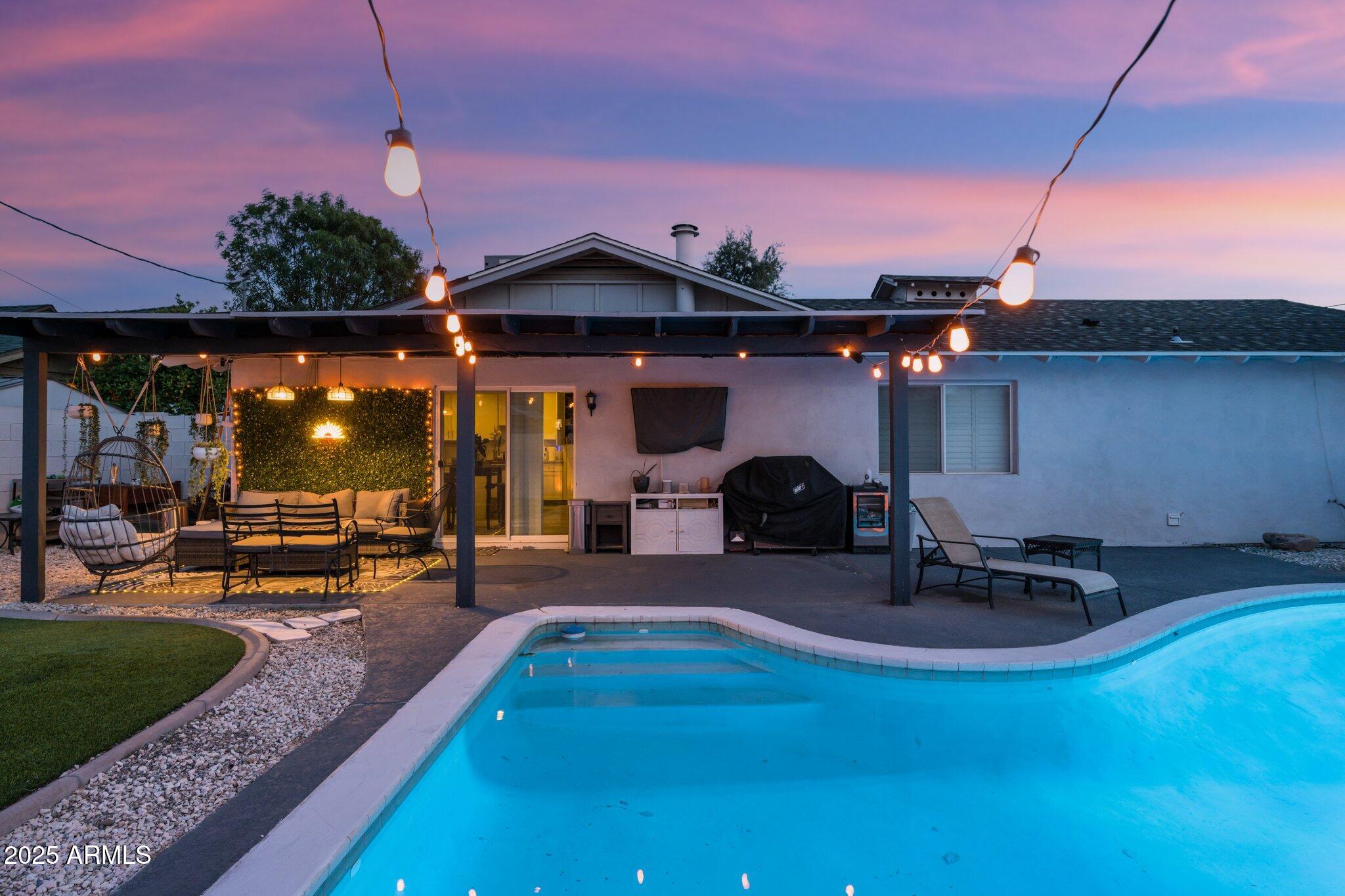 8728 East Monte Vista Road Scottsdale, AZ 85257 - Photo 23 of 28 a view of a house with backyard and sitting area