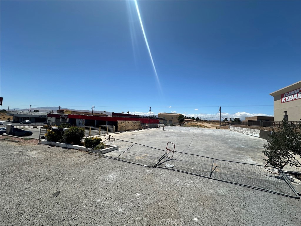 17153 Bear Valley Road Hesperia, CA 92345 - Photo 3 of 9 a view of a parking space