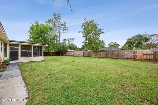 a view of a backyard with a garden