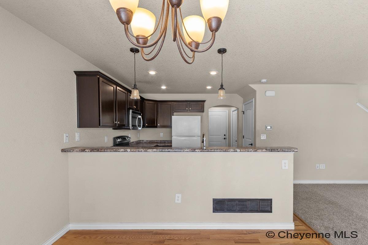 3908 Raindancer Trail Cheyenne, WY 82001 - Photo 11 of 31 Gallery Image 11