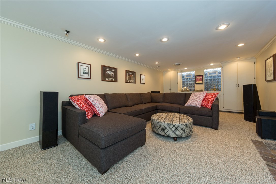 2487 Channing Road Cleveland, OH 44118 - Photo 27 of 35 The large Recreation Room with cabinetry and glass block windows