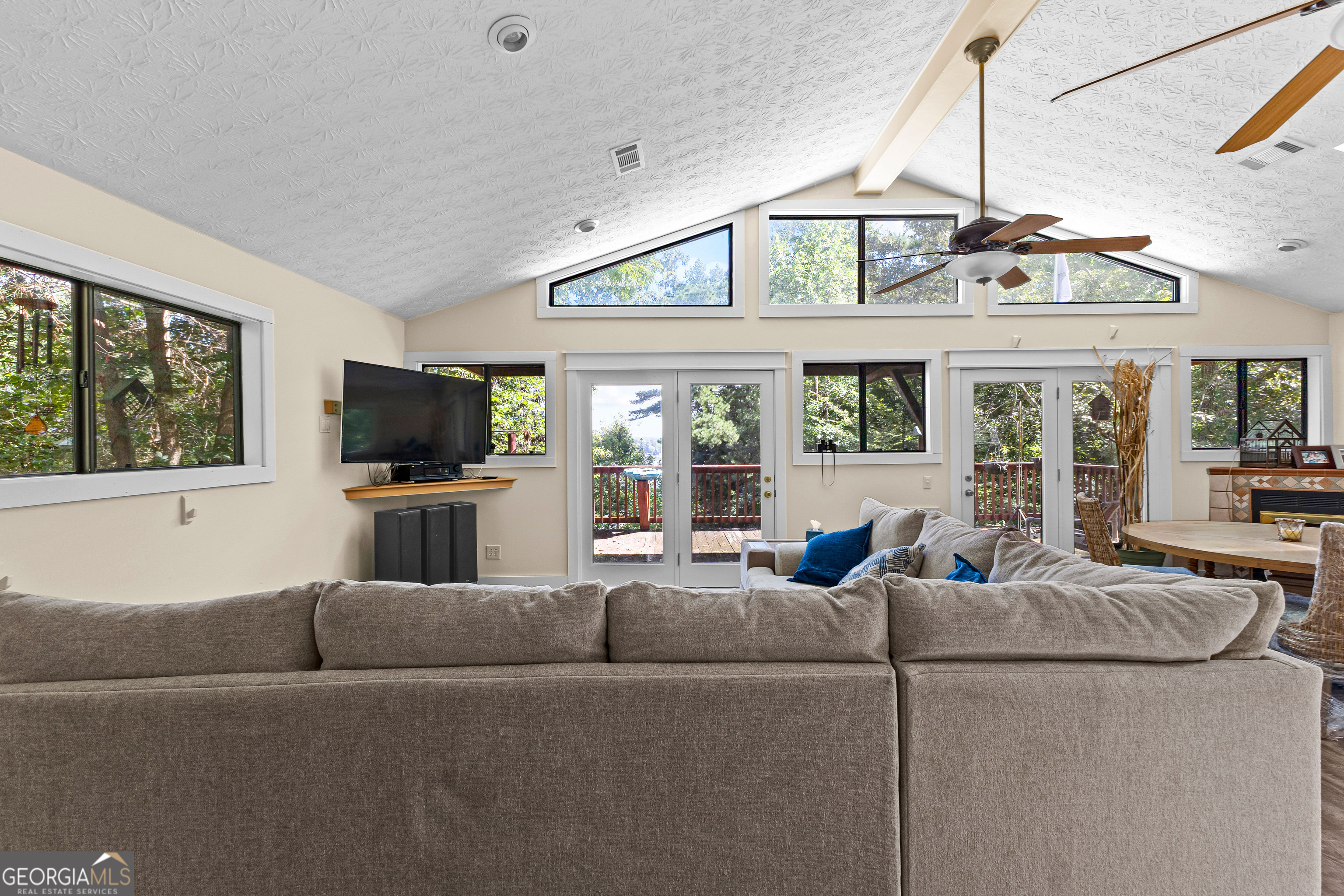 329 Chickadee Court Monticello, GA 31064 - Photo 15 of 59 a living room with furniture and a flat screen tv