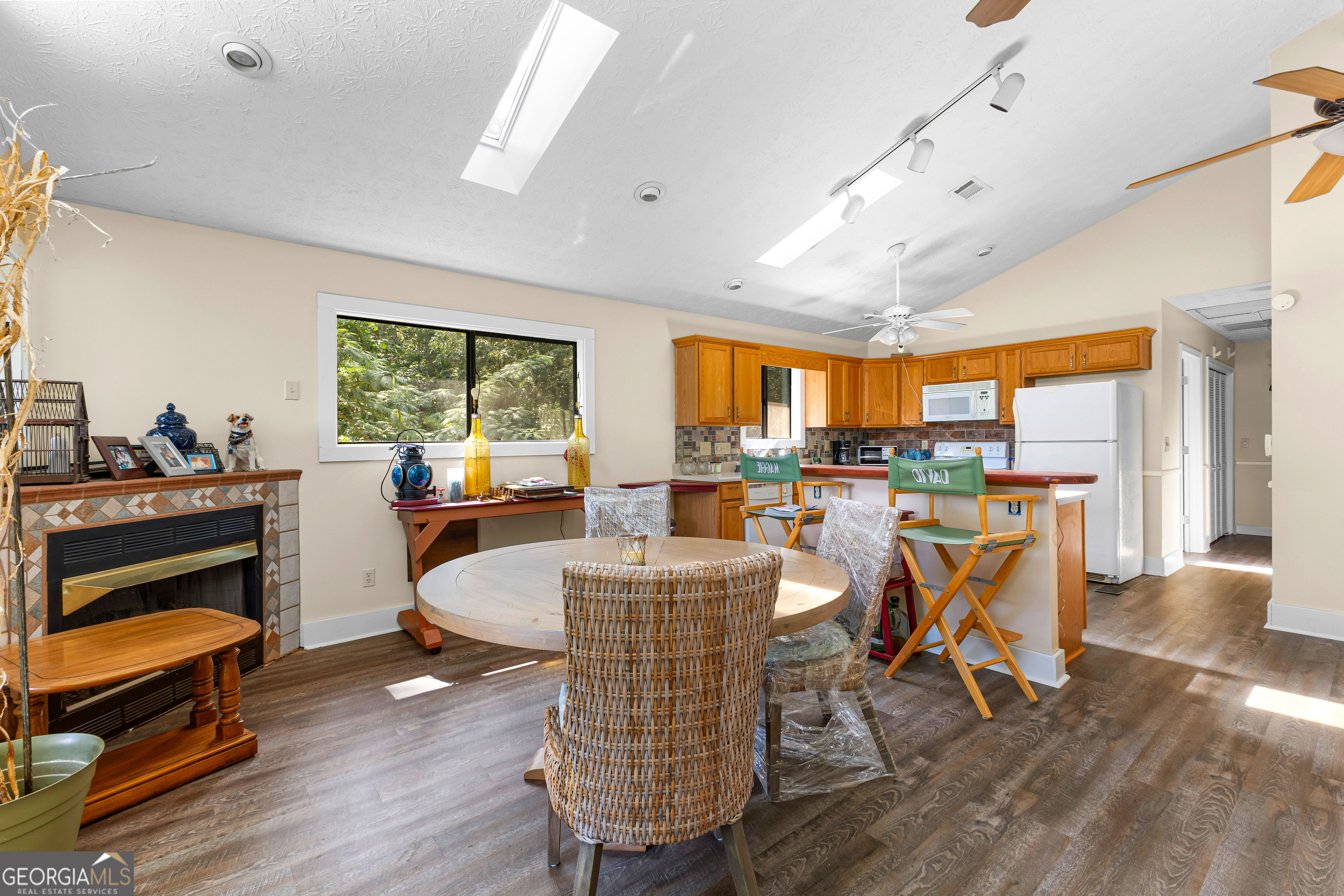 329 Chickadee Court Monticello, GA 31064 - Photo 22 of 59 a living room with furniture a wooden floor and next to a window