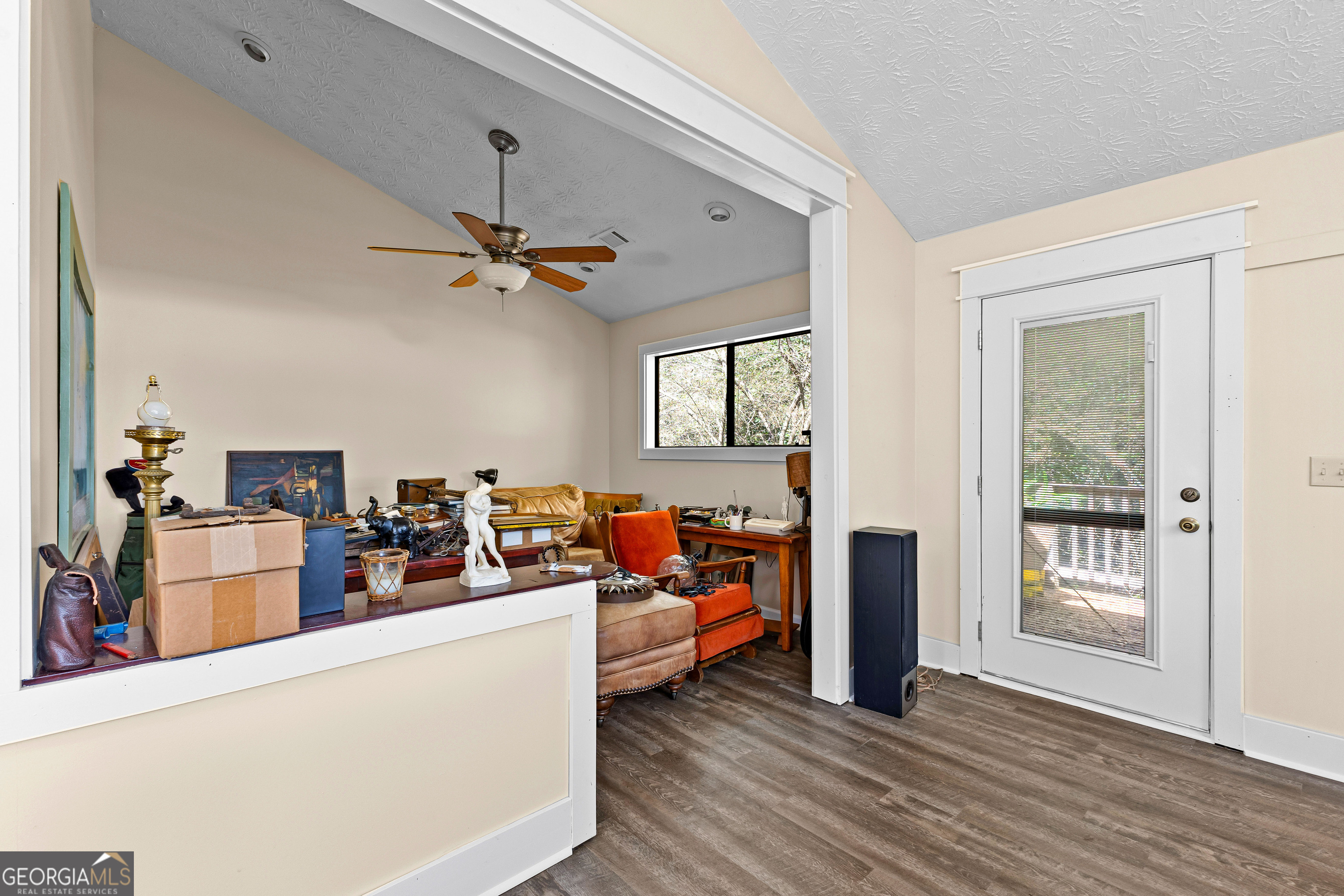329 Chickadee Court Monticello, GA 31064 - Photo 25 of 59 a view of a livingroom with furniture and a ceiling fan