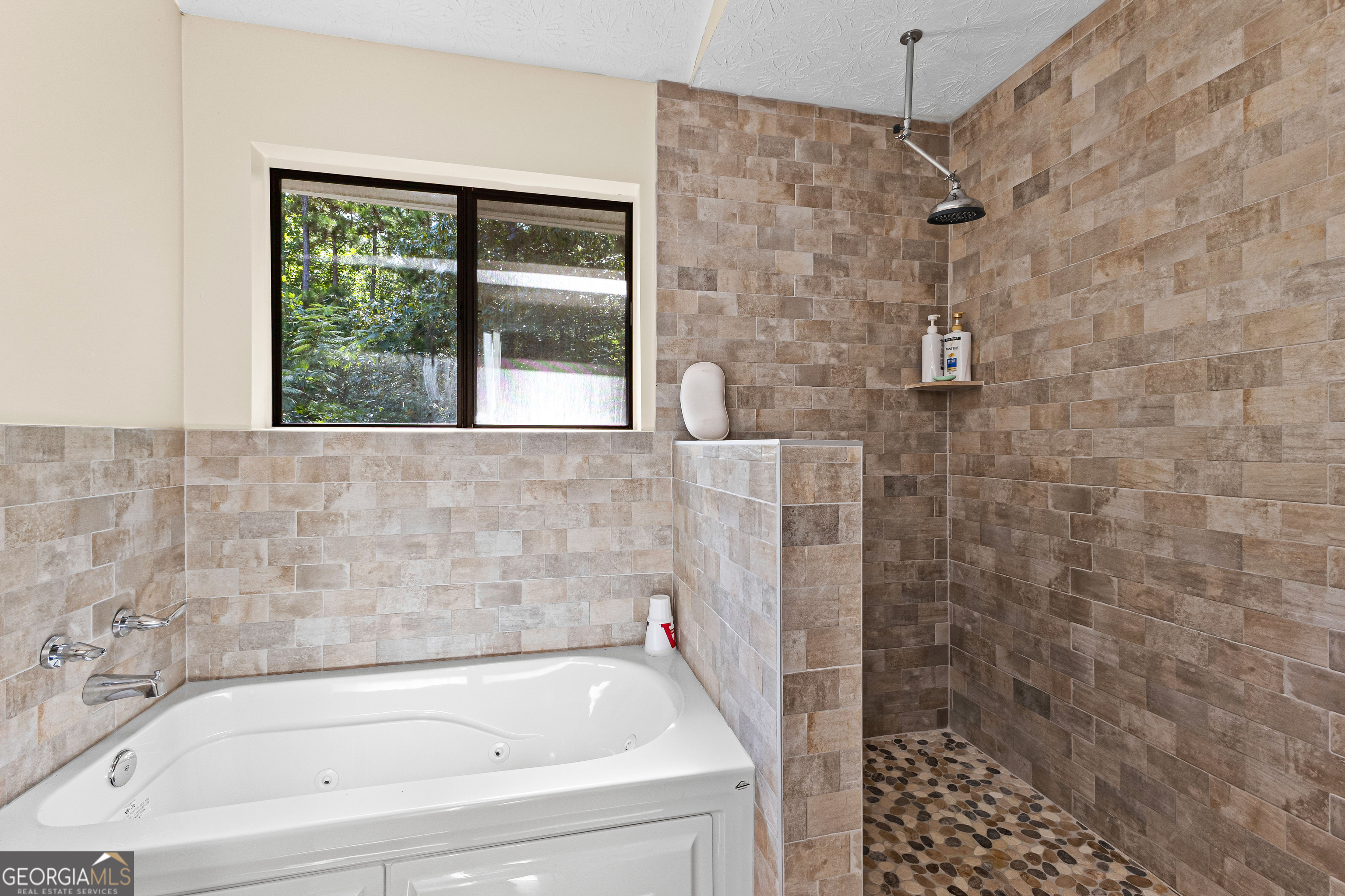 329 Chickadee Court Monticello, GA 31064 - Photo 40 of 59 a bathroom with a shower