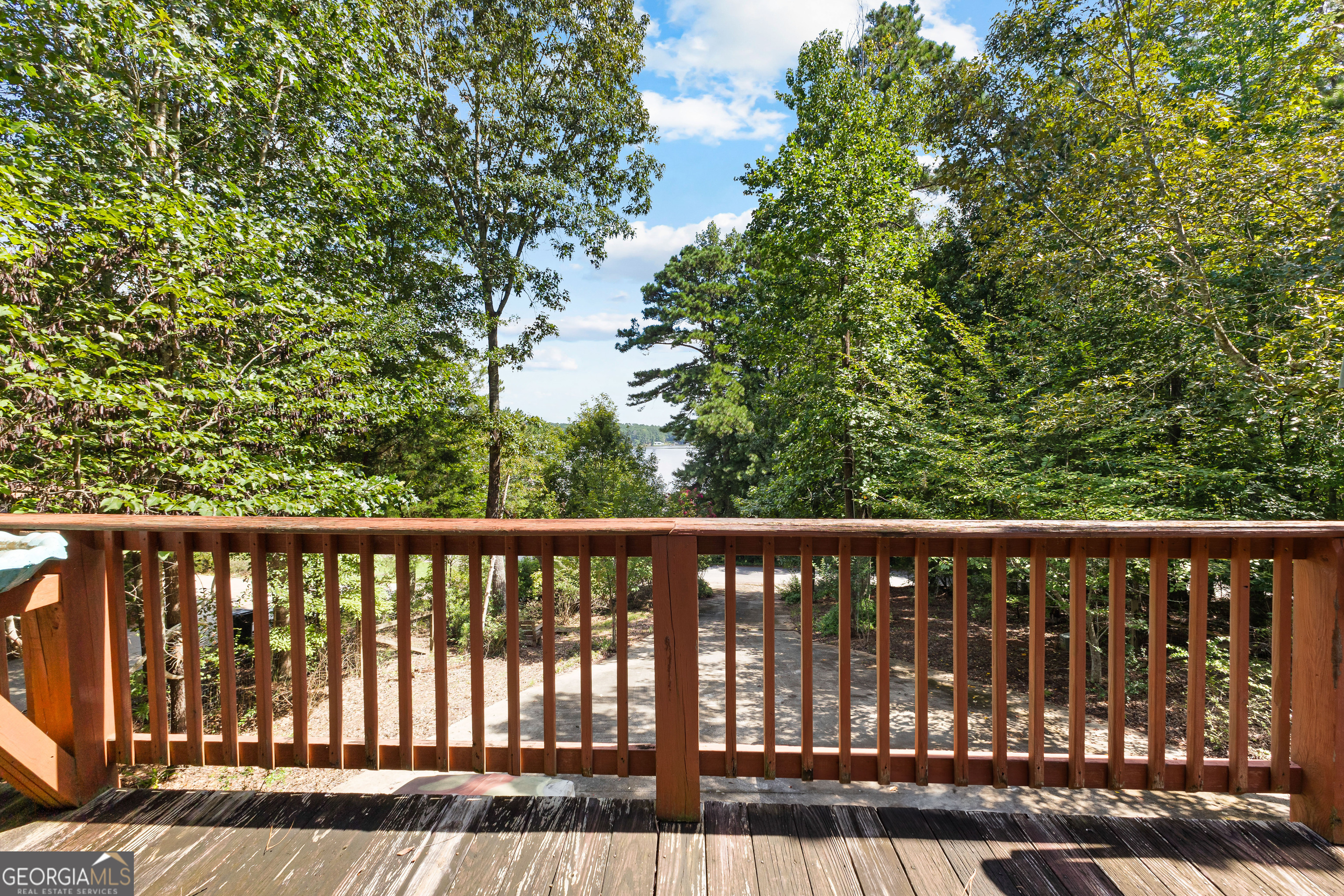 329 Chickadee Court Monticello, GA 31064 - Photo 45 of 59 a view of a wooden roof deck