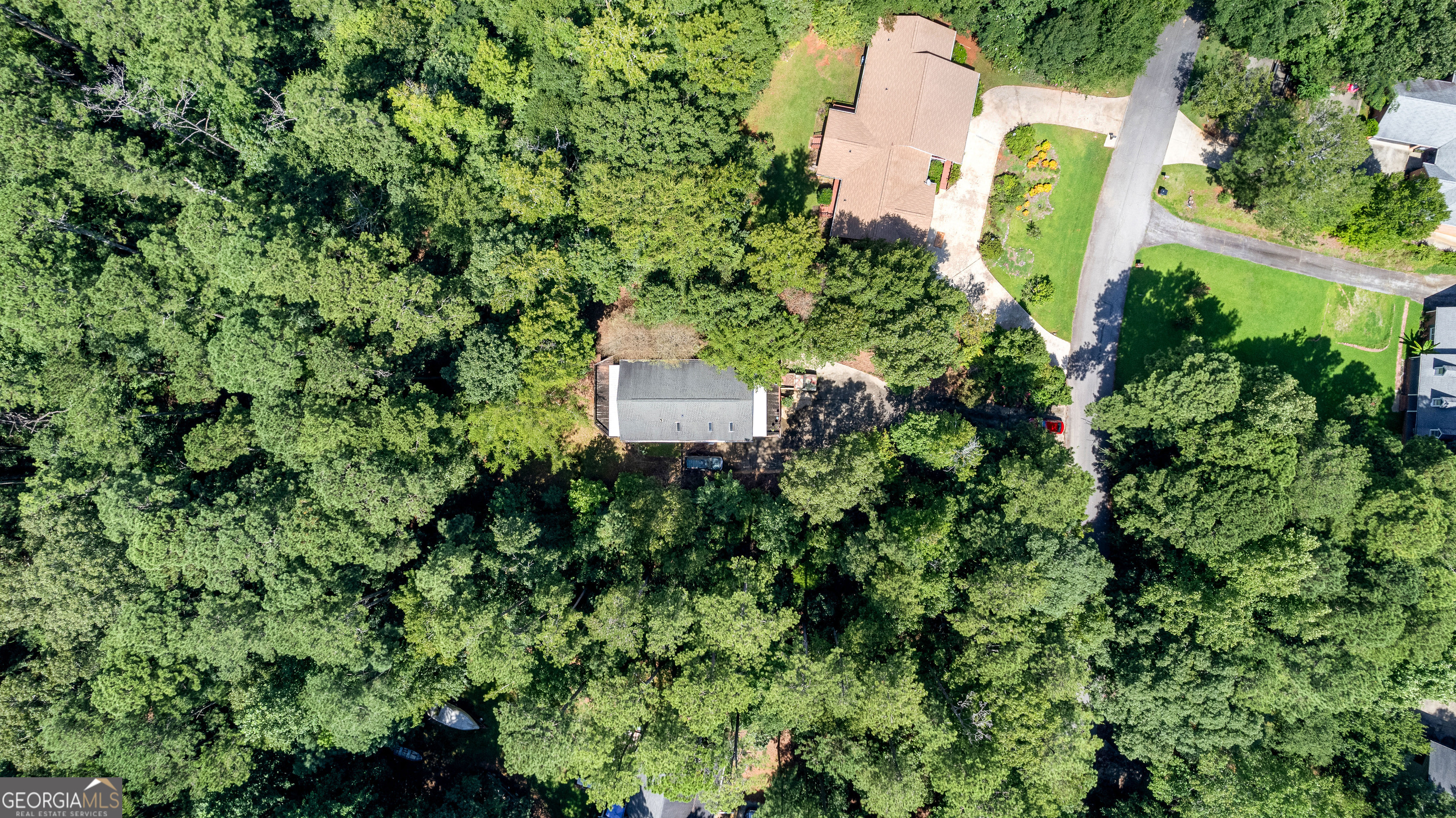 329 Chickadee Court Monticello, GA 31064 - Photo 55 of 59 an aerial view of residential house with outdoor space and trees all around