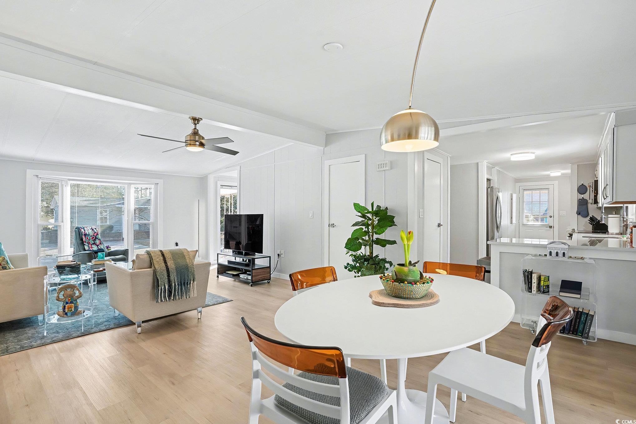 3268 Pecan Trail Murrells Inlet, SC 29576 - Photo 10 of 38 Dining area with light wood-style flooring, plenty of natural light, and a ceiling fan