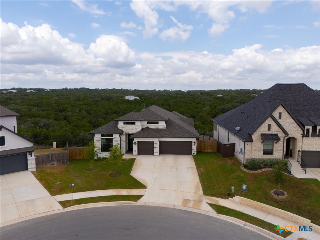 132 Lambs Ear Path San Marcos, TX 78666 - Photo 2 of 43 aerial view of a house with a yard