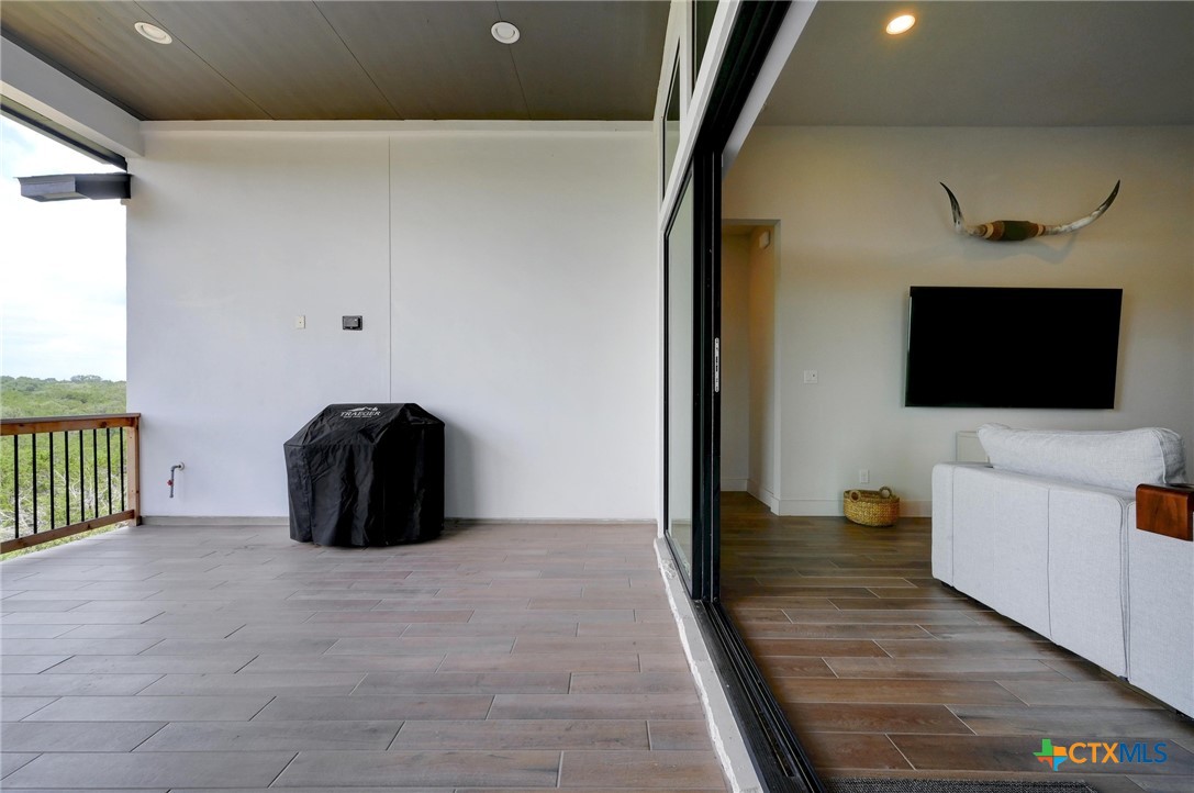 132 Lambs Ear Path San Marcos, TX 78666 - Photo 31 of 43 view of living room with furniture and a flat screen tv