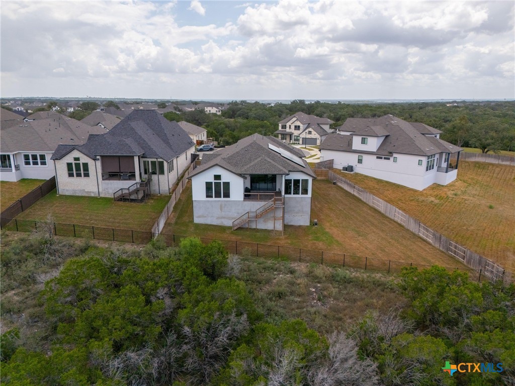 132 Lambs Ear Path San Marcos, TX 78666 - Photo 37 of 43 an aerial view of residential houses with outdoor space and city view