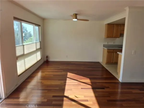 a view of empty room with closet
