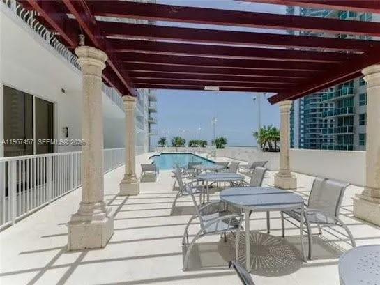 a view of workspace with window and outdoor seating