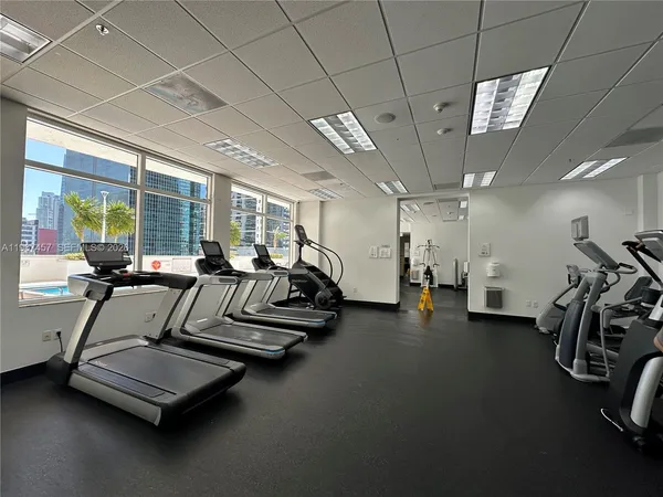 a view of a room with gym equipment