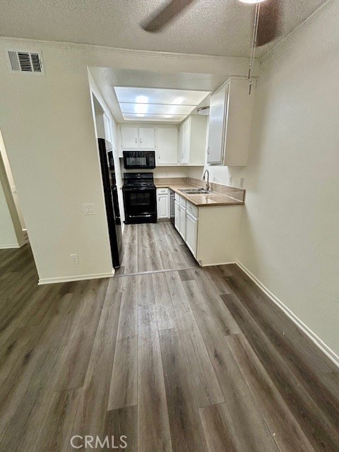 68460 Kings Road, Unit C Cathedral City, CA 92234 - Photo 11 of 18 a view of kitchen with sink and refrigerator