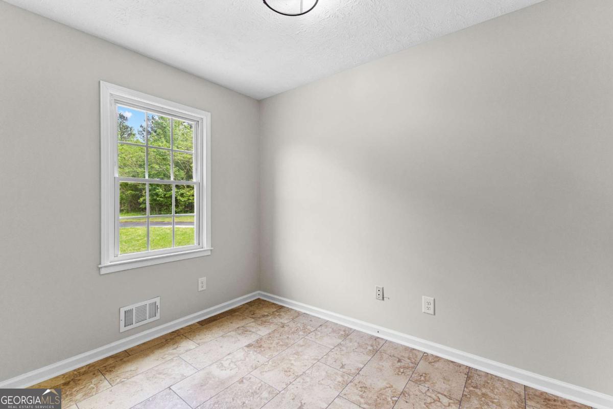 550 Davis Road Fayetteville, GA 30215 - Photo 25 of 75 a view of a room with a window