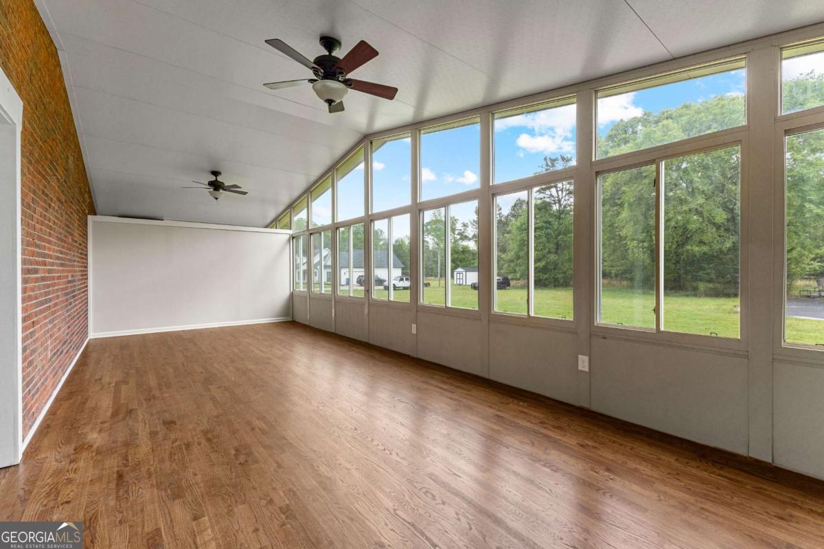 550 Davis Road Fayetteville, GA 30215 - Photo 31 of 75 a view of an empty room with a window