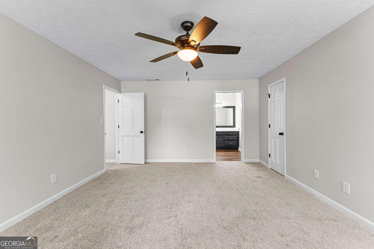 550 Davis Road Fayetteville, GA 30215 - Photo 44 of 75 a view of an empty room and window