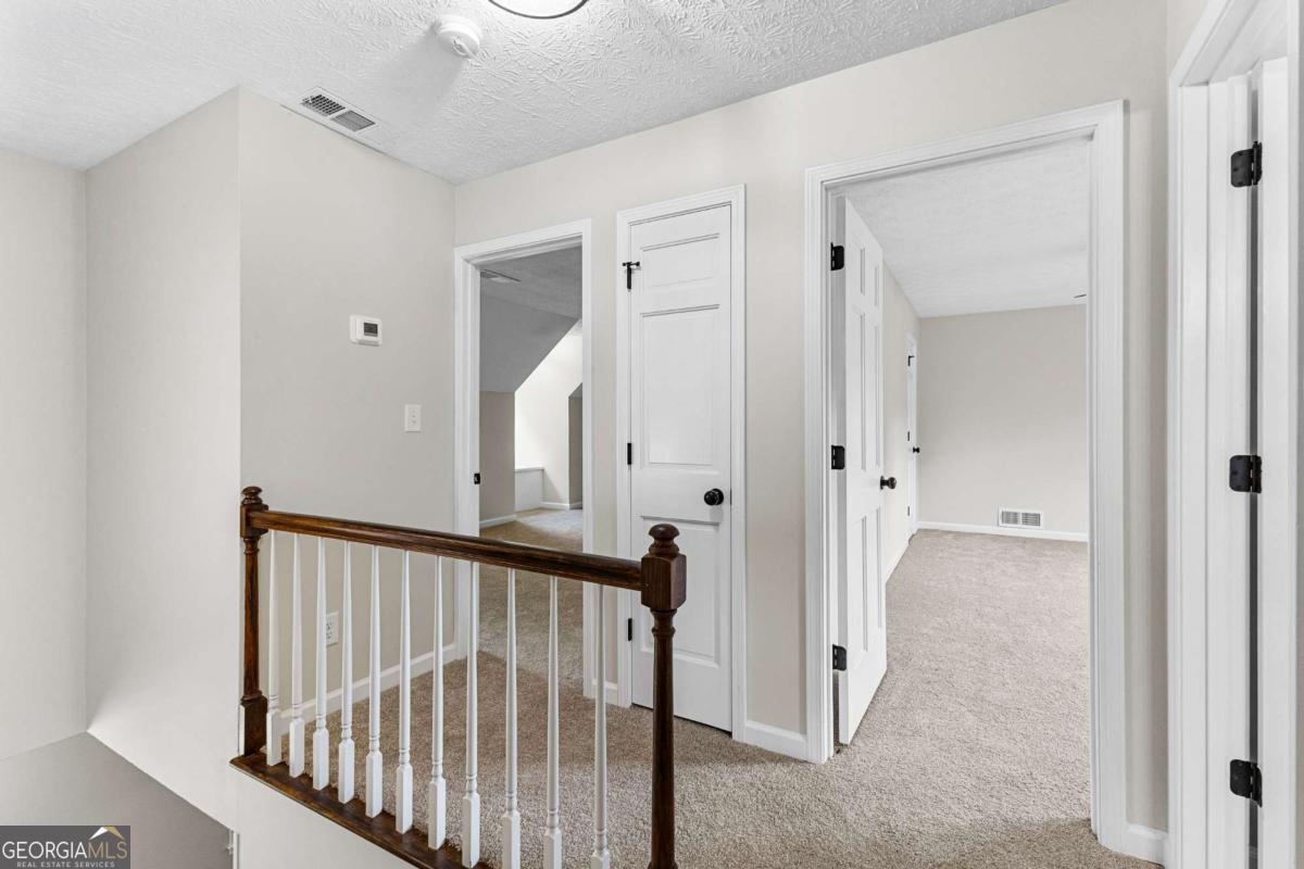 550 Davis Road Fayetteville, GA 30215 - Photo 47 of 75 a view of a hallway with entryway