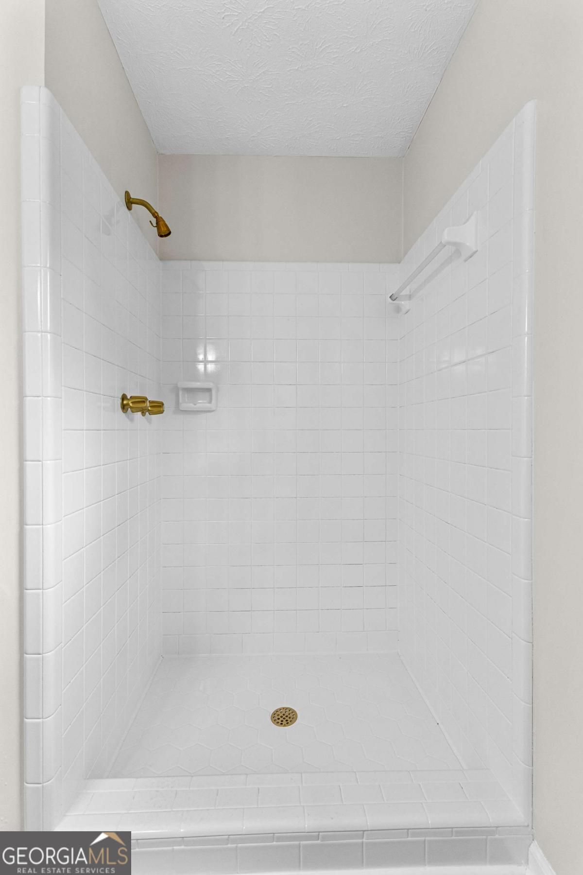 550 Davis Road Fayetteville, GA 30215 - Photo 53 of 75 a bathroom with a shower