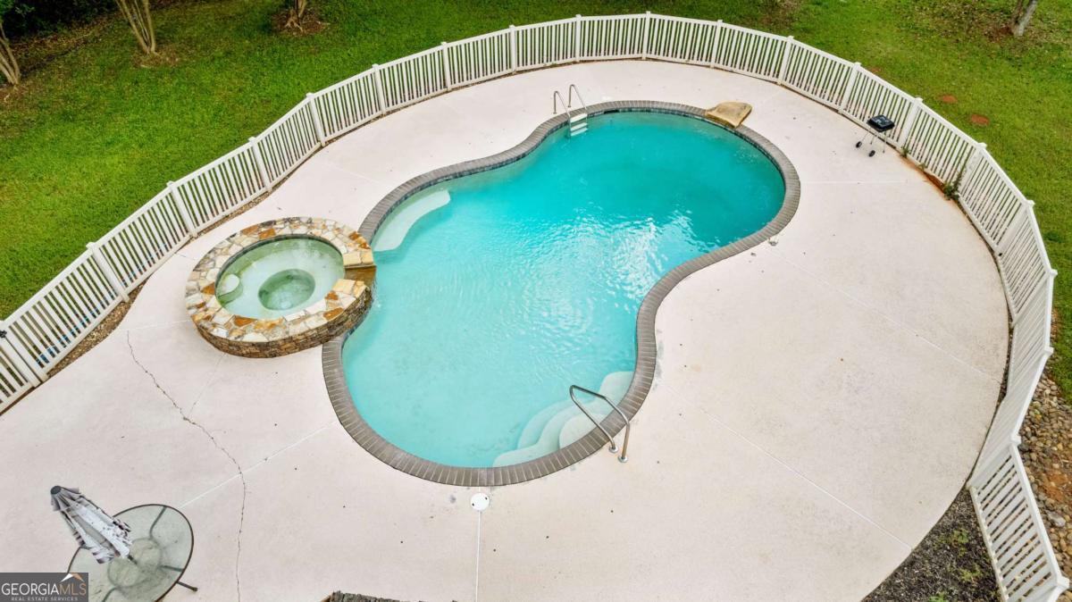 550 Davis Road Fayetteville, GA 30215 - Photo 62 of 75 an aerial view of a swimming pool and outdoor space
