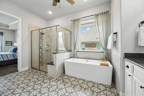 a bathroom with a sink a mirror and a shower