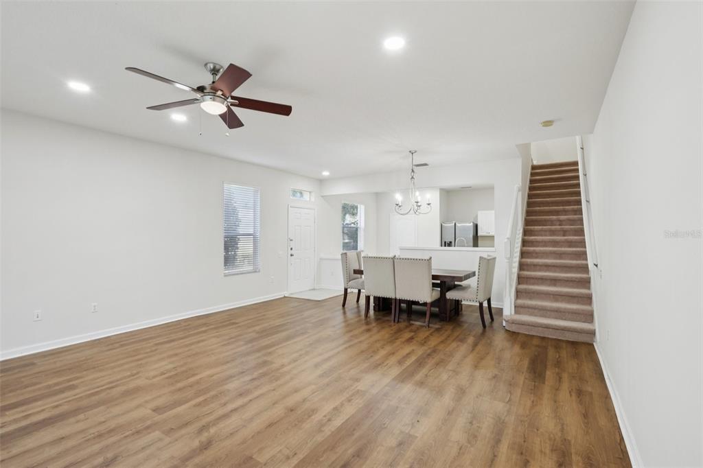 5001 Barnstead Drive Riverview, FL 33578 - Photo 8 of 37 a view of dining room with furniture and wooden floor