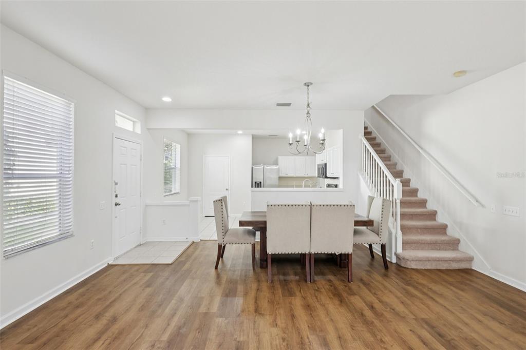 5001 Barnstead Drive Riverview, FL 33578 - Photo 9 of 37 a view of kitchen and dining room with wooden floor