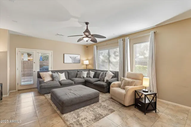 a living room with furniture and a window