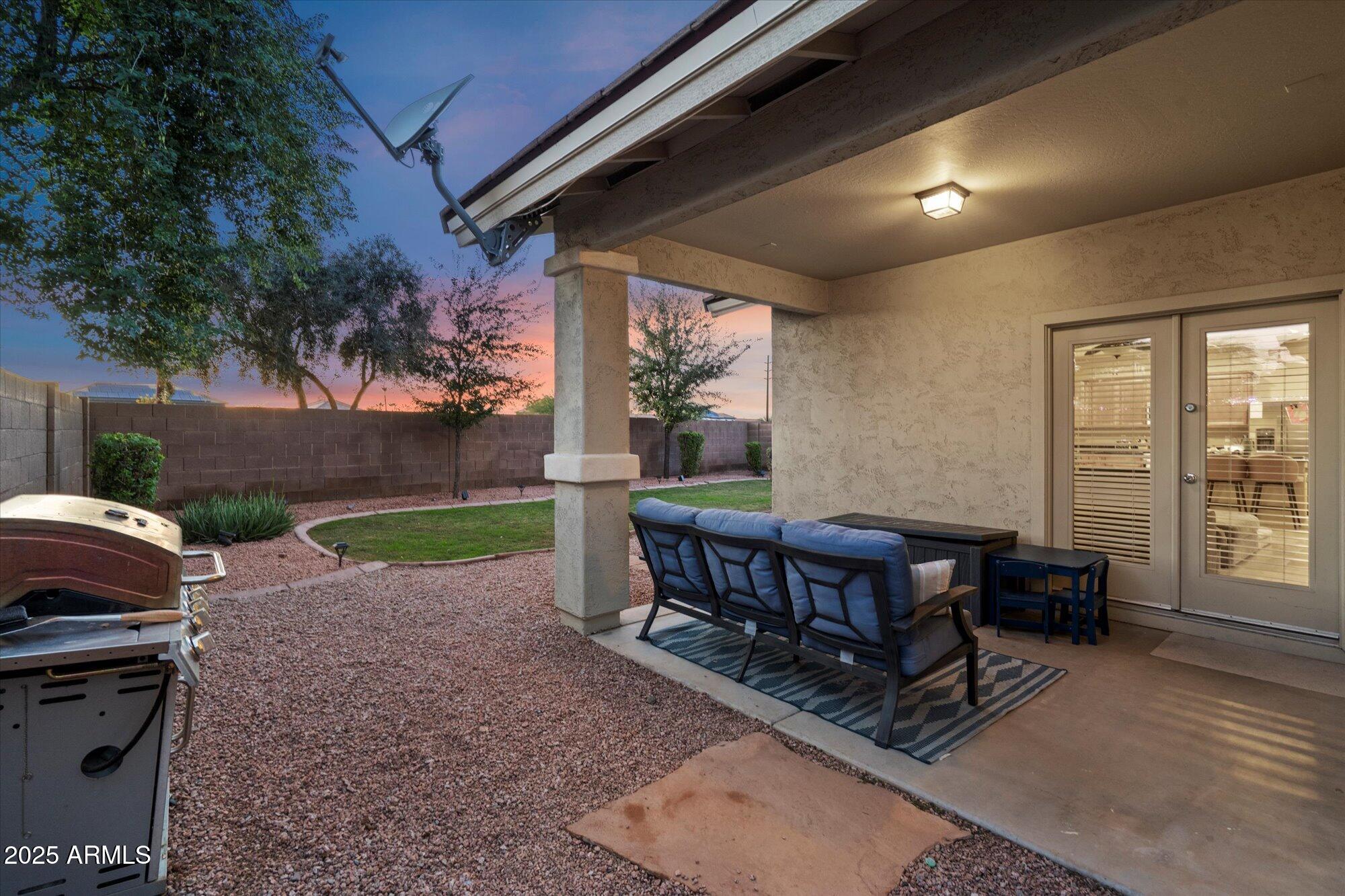 6710 South Seton Avenue Gilbert, AZ 85298 - Photo 34 of 51 a view of a house with backyard porch and sitting area