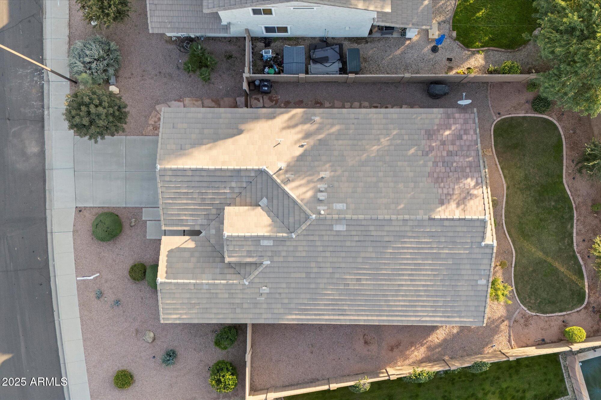 6710 South Seton Avenue Gilbert, AZ 85298 - Photo 40 of 51 an aerial view of a house with backyard and sitting area