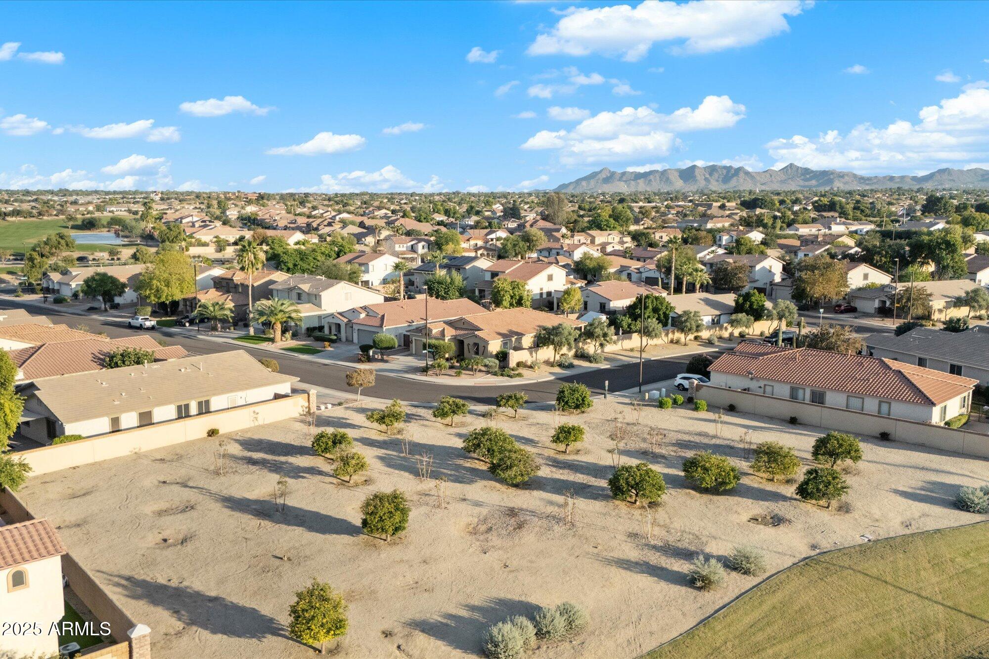 6710 South Seton Avenue Gilbert, AZ 85298 - Photo 45 of 51 an aerial view of residential houses with outdoor space