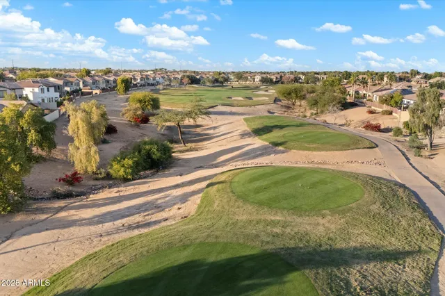 a view of an ocean and houses