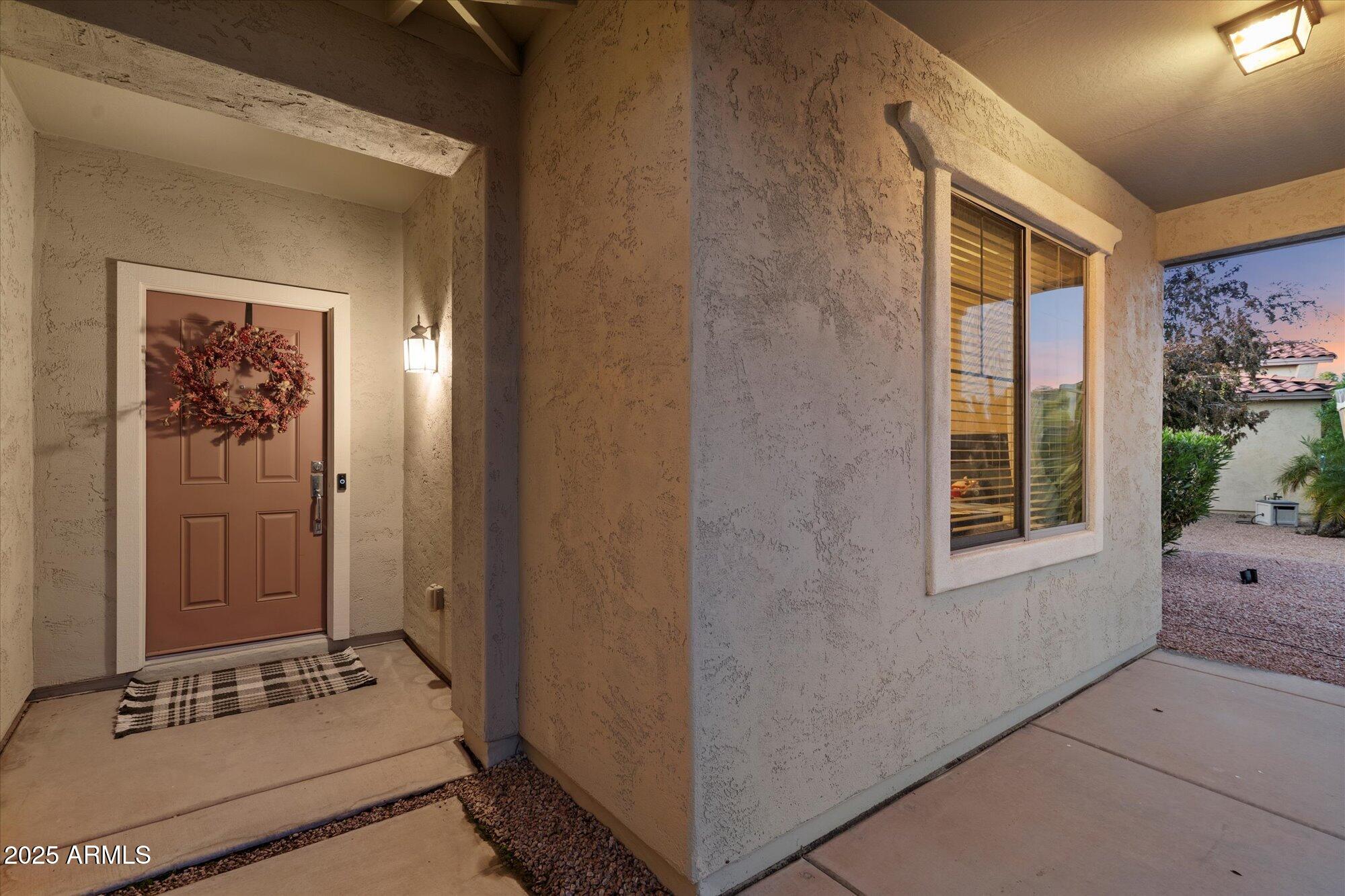 6710 South Seton Avenue Gilbert, AZ 85298 - Photo 5 of 51 a view of room with window and hallway
