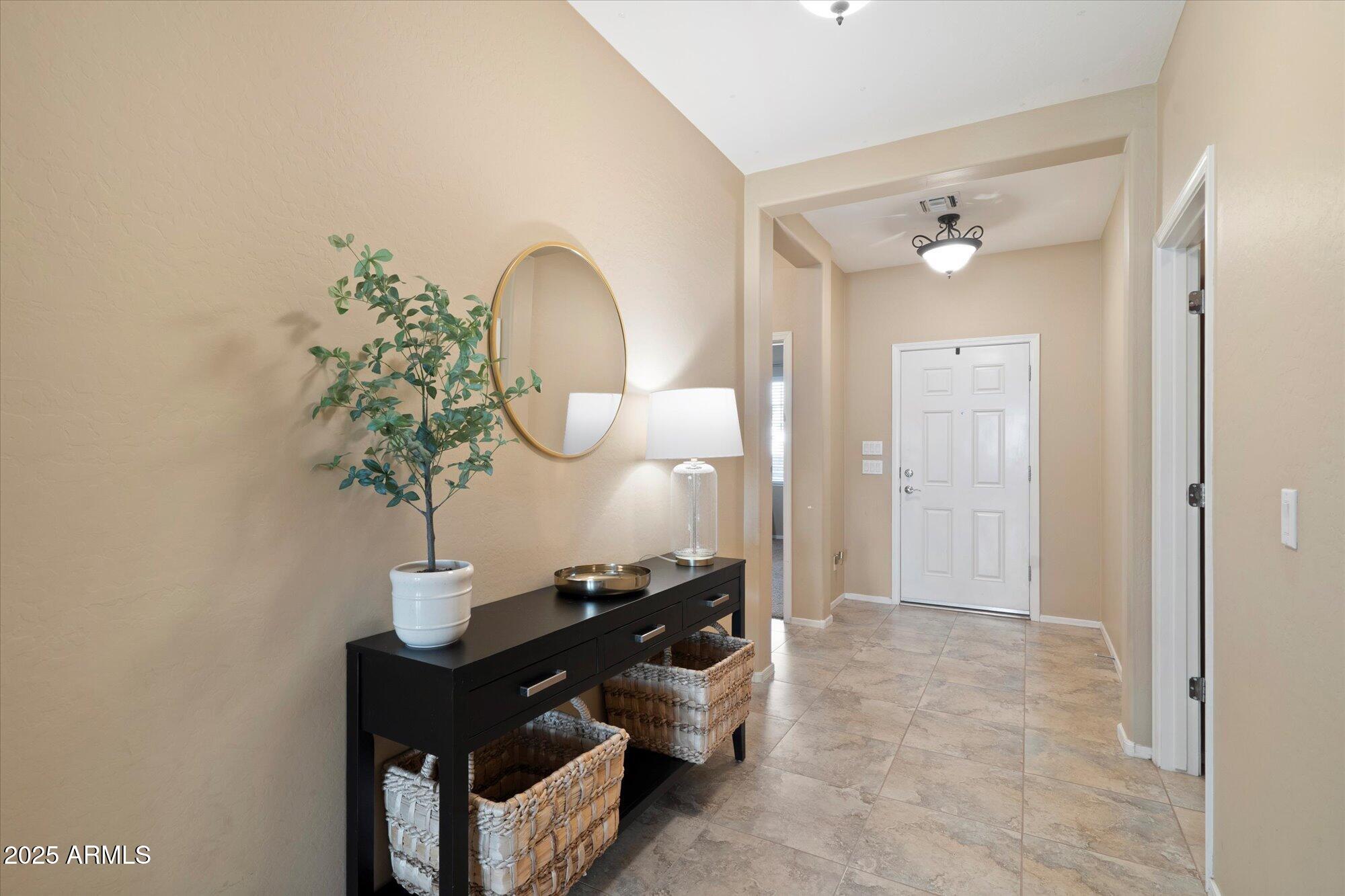 6710 South Seton Avenue Gilbert, AZ 85298 - Photo 6 of 51 a living room with furniture