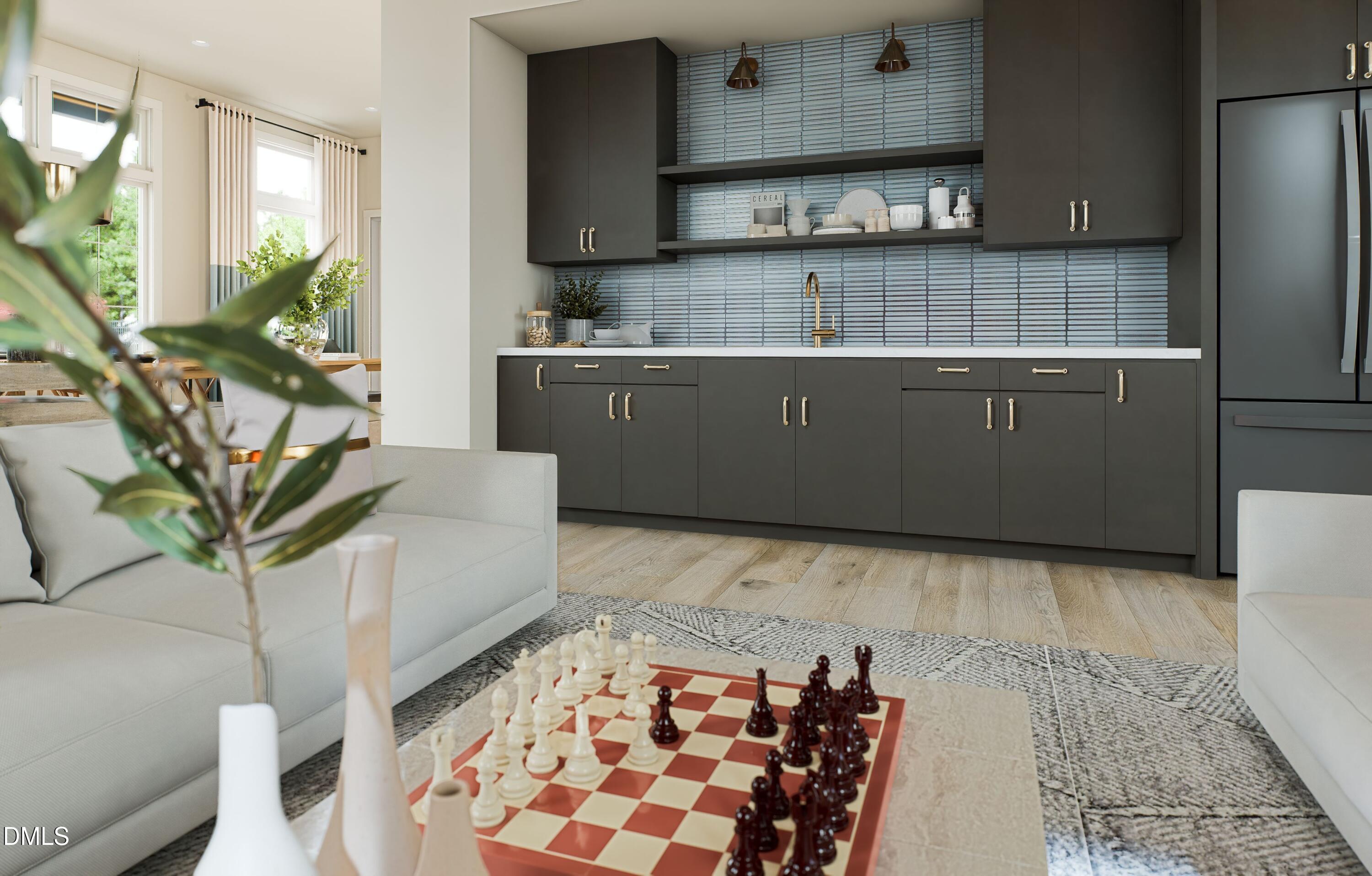 740 Bolera Road Knightdale, NC 27545 - Photo 23 of 32 a kitchen with stainless steel appliances granite countertop a sink a stove a refrigerator and cabinets